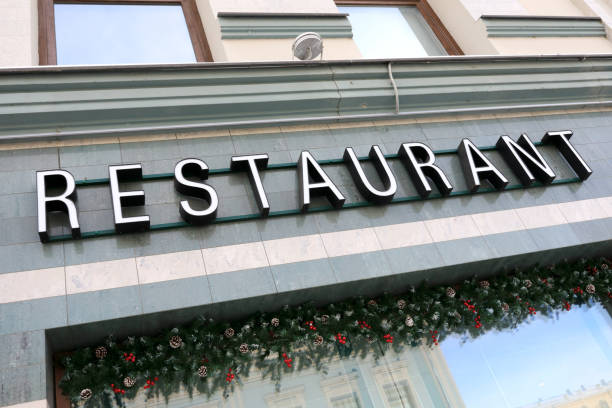 istock View of restaurant signboard on wall building 1300664367