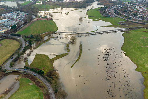 Wide angle aerial view of flooded river in UK