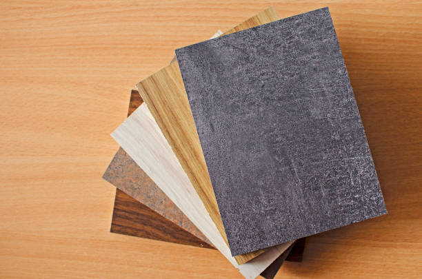 istock Several pieces of chipboard with texture on wood background. 1300666418