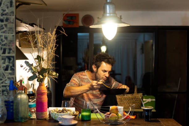istock man in the kitchen of his house 1300673247