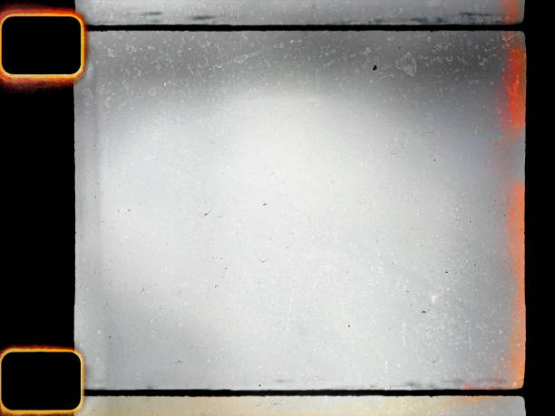 empty or blank 16mm film frame with black border and dust.