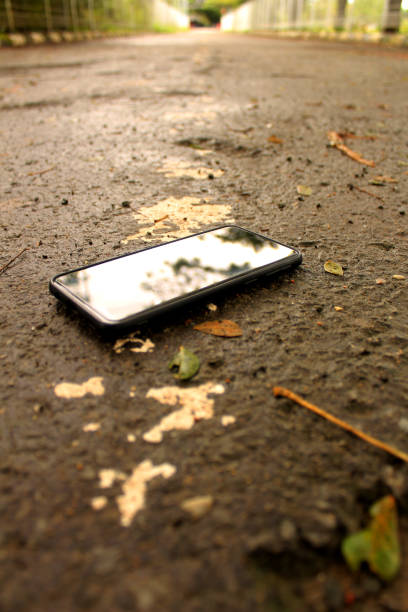 Smartphone on the groubd street