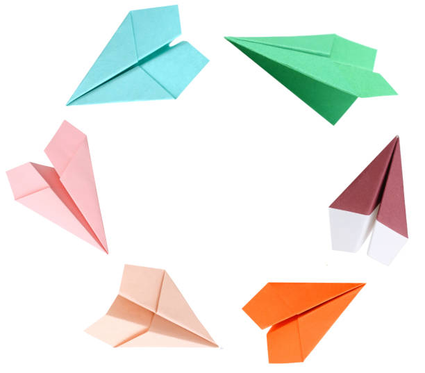 istock Colorful origami planes on circle 1300675980