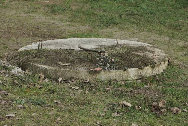 istock one big old dirty gray concrete sewer manhole 1300676971