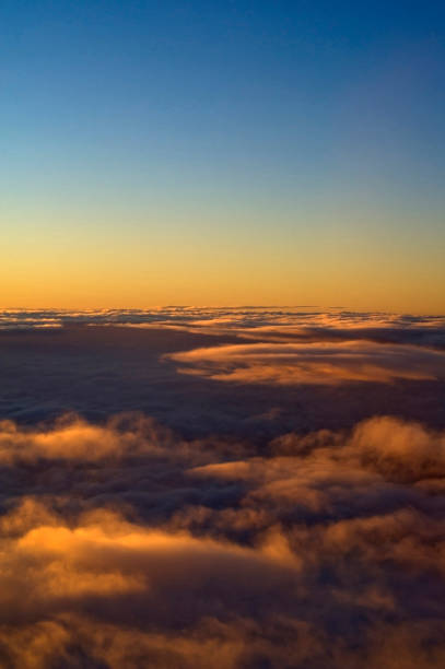 istock View of clouds in the sky from an airplane window 1300677061