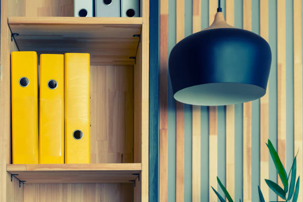 istock File folders, standing on the shelves at office 1300679097