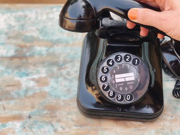 istock Still life with a black vintage telephone 1300679270