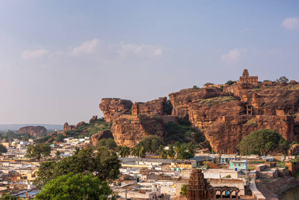 istock Cityscape with red cliffs rocks and temples, Badami, Karnataka, India 1300679863