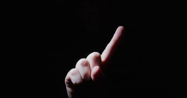 istock Hand is showing warning stop sign 1300682311