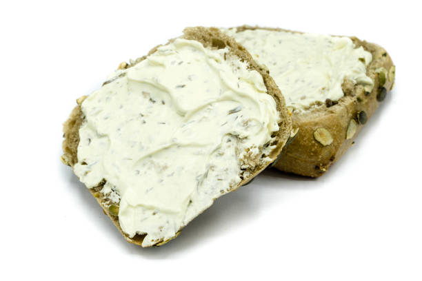 istock Bun with cream cheese isolated on white background 1300683339
