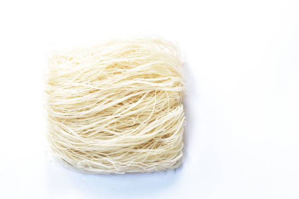 istock dry instant vermicelli thin noodles raw food on white background 1300684963