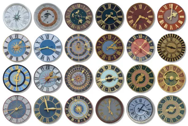 Photo of regular rows out of multicolored ancient church tower clocks