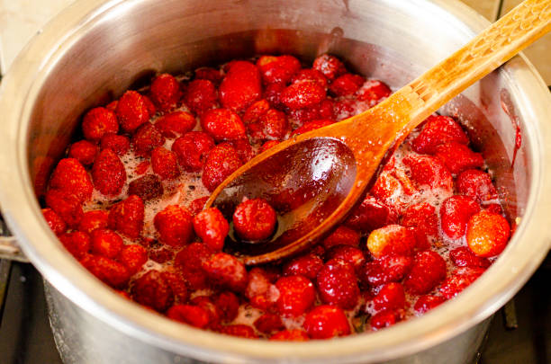 istock Strawberries are boiled with sugar in pan. 1300687603