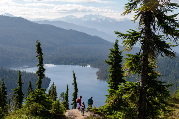 istock Family bonding on a mountain adventure 1300689688