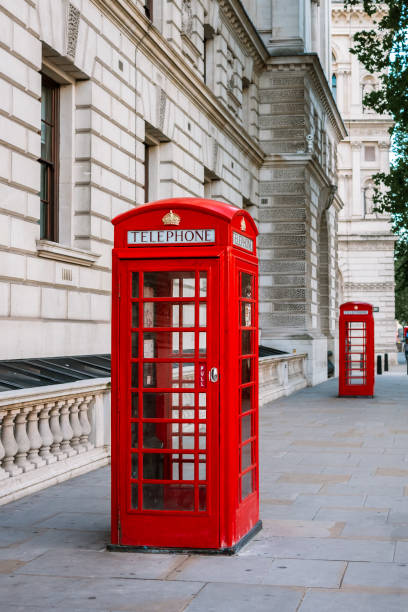 istock Old traditional red telephone booth in London 1300689944
