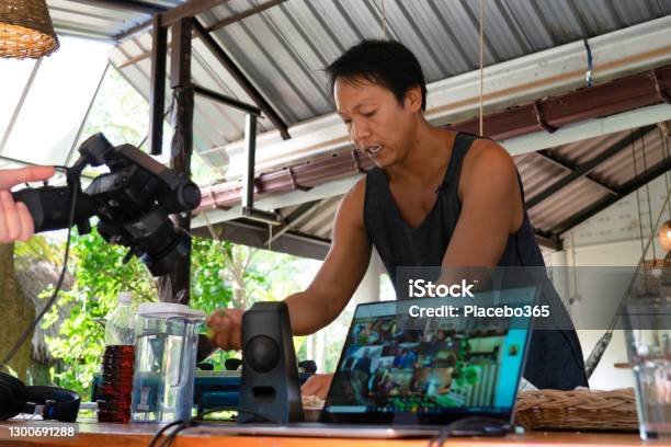 Asian Youtuber Live Streaming From Home Stock Photo - Download Image Now - Live Streaming, Photographer, Camera Operator