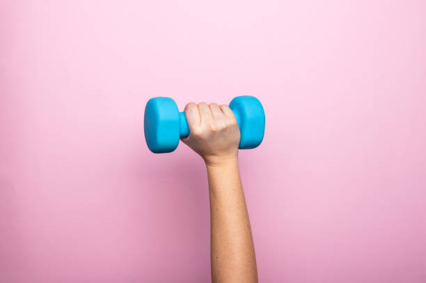 istock Fitness concept on pink backdrop 1300692774