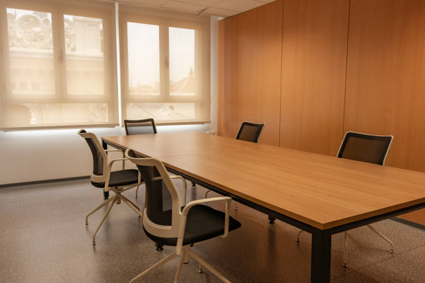 istock Office or meeting room table and chairs 1300694887