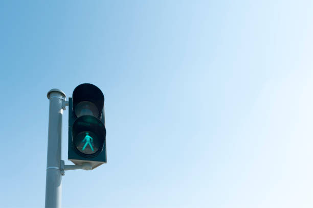 Traffic lights, sidewalk, green light, pathway stock photo