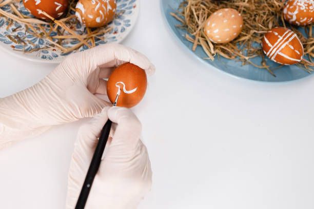 istock Easter tradition of painting eggs 1300705930