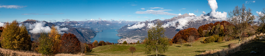 Autumnal panoramic view of Lake Como from the top of the Western Horn of Canzo.