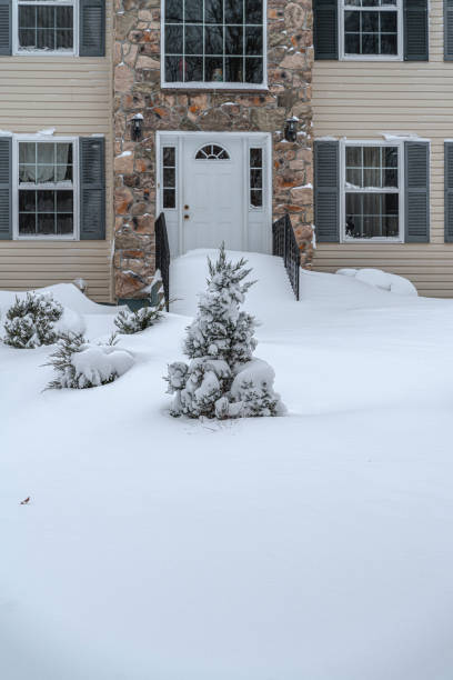 istock Aftermath. The residential house covered with the snow after heavy snowfall. 1300709823
