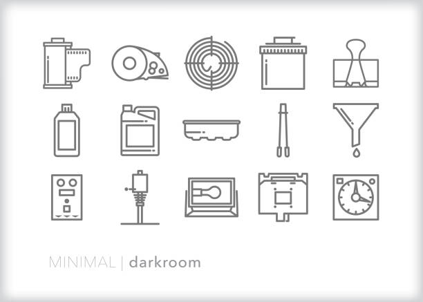 Darkroom photography icons Set of 15 icons of items used in a darkroom when developing film and printing photos photographic enlarger stock illustrations