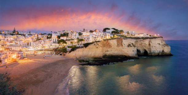 Landscape with Carvoeiro town Landscape with Carvoeiro town at twilght time, Algarve, Portugal lagos portugal stock pictures, royalty-free photos & images