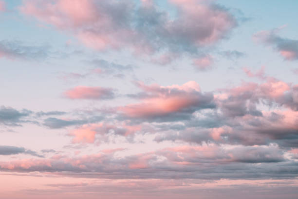 istock Sunset sky with clouds and red reflections from the sun. Bright colorful background 1300713673