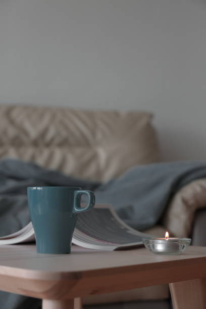 istock Cup of tea on the sofa 1300713731