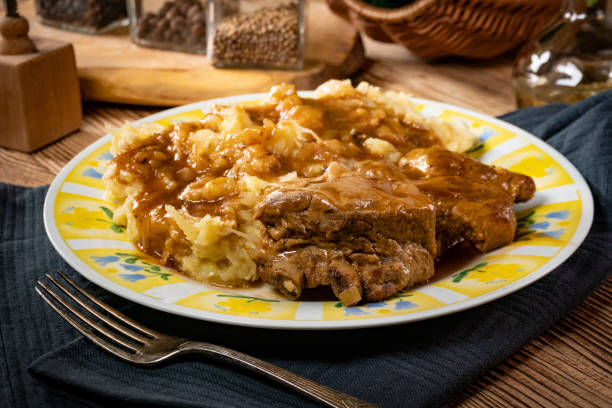 istock Delicious pork ribs stewed in gravy. 1300715465
