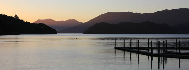 istock Ocean and hills at sunset. 1300732209