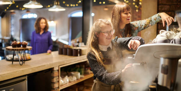 istock young female barista 1300735658