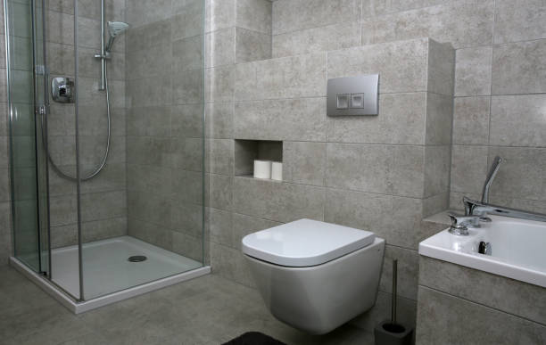 istock Modern bathroom in gray colors in a simple style 1300737458