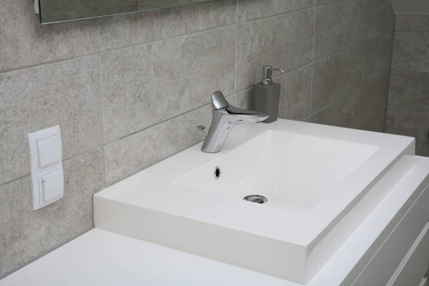 istock White sink with fauch in a modern apartment 1300737514
