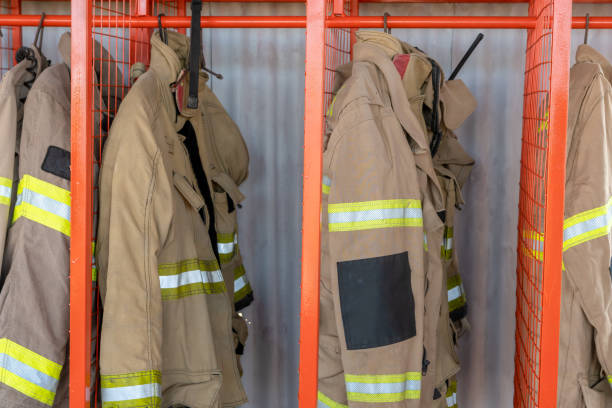 istock Firefighter uniforms horizontal photo in station 1300738319