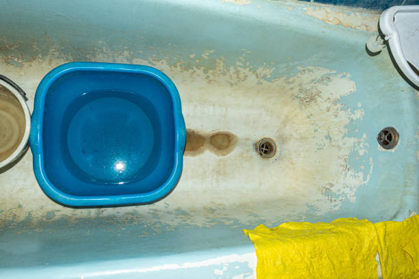 istock Bad dirty unsanitary bathtub with peeling enamel 1300738462
