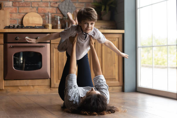istock Caring mom have fun playing with little son 1300739227
