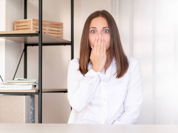 istock shocked woman online conference videochat 1300739286
