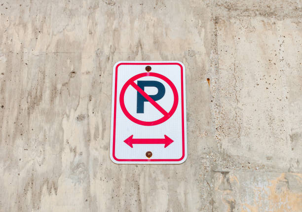 istock A no parking sign on a textured concrete wall 1300745033