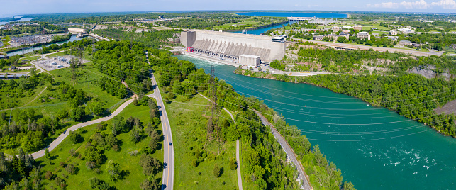 Aerial view of a gravity fed hydroelectric dam, which pumps water through the turbines and generates clean, renewable energy from stored water