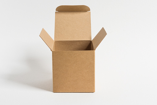 Open empty cardboard box on a white background.
Copy space for your designs.