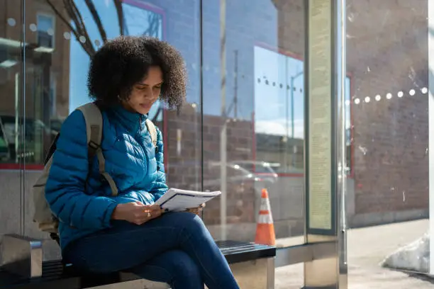 Student going on public transport to college