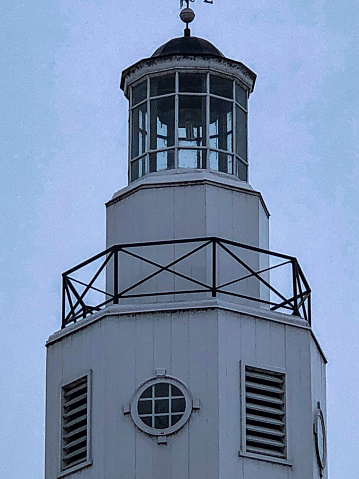 The beautiful details on the top of a white lighthouse were observed in Neenah, Wisconsin at Kimberly Point.