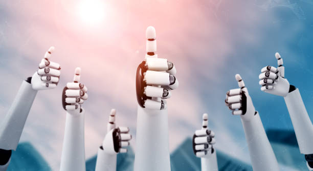 istock Robot humanoid hands up to celebrate goals success achieved by using AI 1300765680