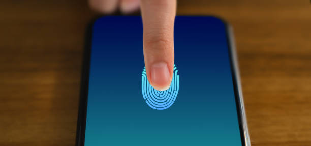 hands touching smartphone and show the fingerprint scanner screen to access online. - carteira de identidade imagens e fotografias de stock