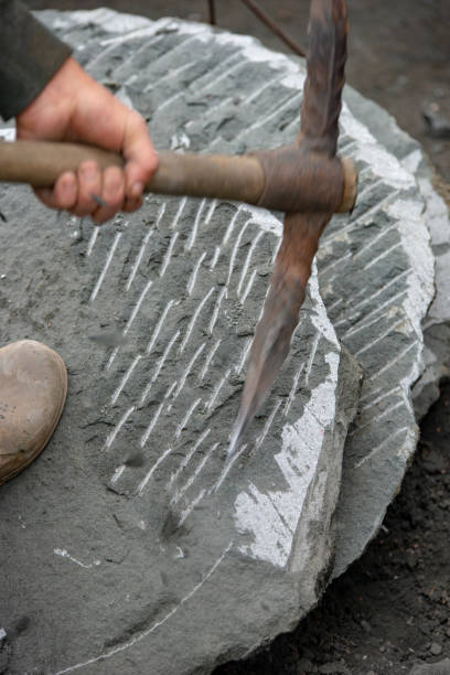 istock making local stone slabs used in bread making 1300775860