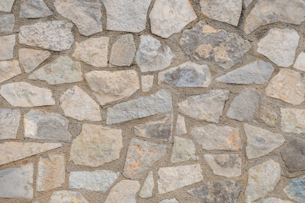 istock image of mortared stone wall in rural environment 1300788805