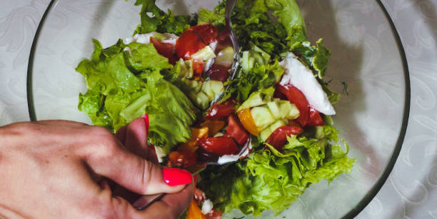 istock Process of preparation of vegetable salad 1300790357