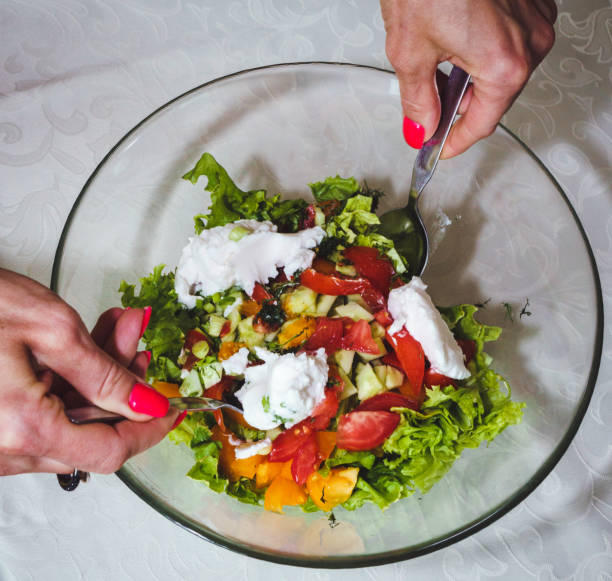 istock Process of preparation of vegetable salad 1300790359